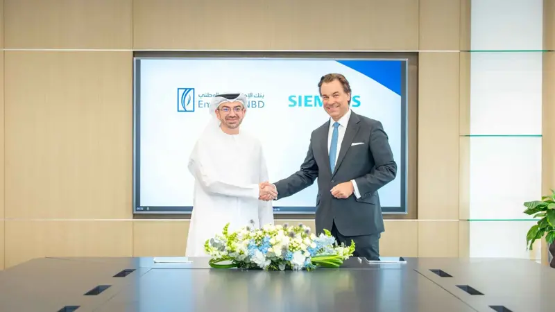 «دبي الوطني» و«سيمنز» يتعاونان لتمويل مشاريع البنية التحتية الخضراء