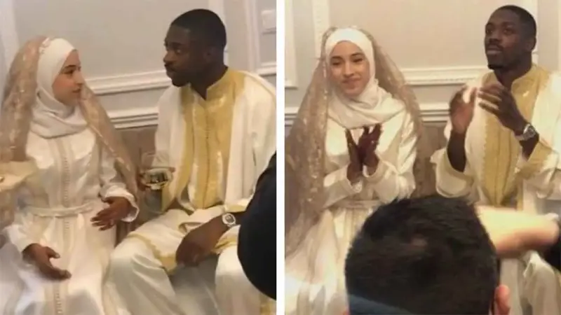 بالكمامة والحجاب في الاحتفالات: زوجة عثمان ديمبلي تلفت الانتباه في باريس (فيديو)