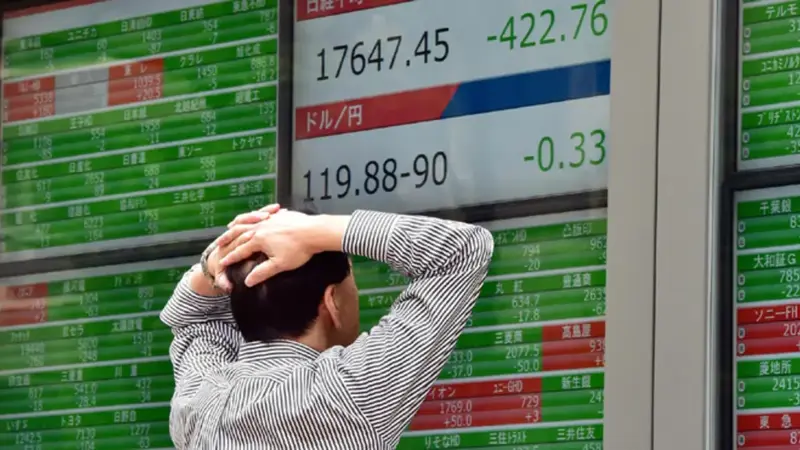 "نيكي" ينخفض مع صعود الين بعد بيانات أمريكية ضعيفة